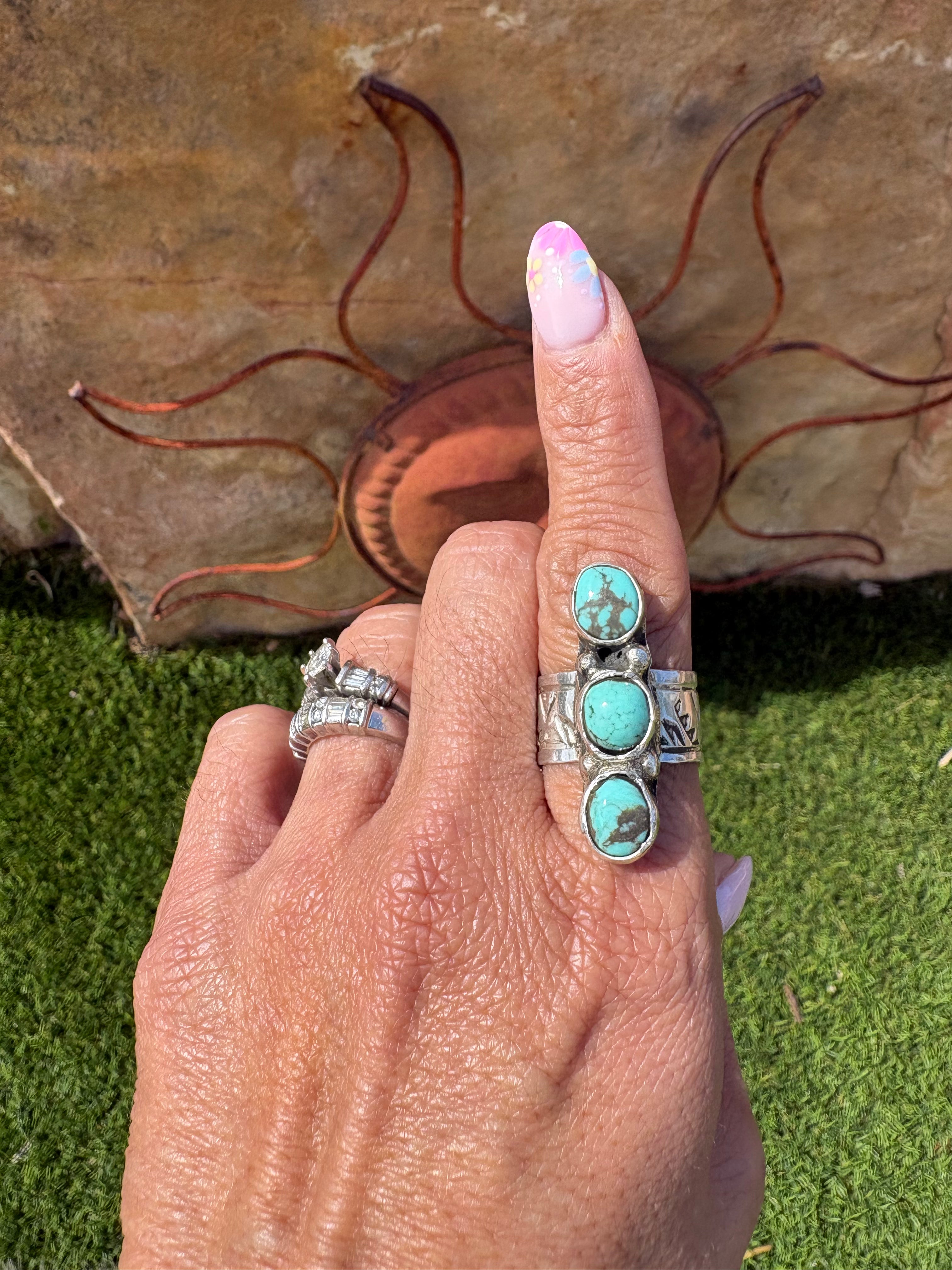 Native made sterling silver with natural eldorado turquoise. Size 8