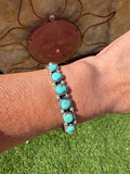 Native made sterling silver with natural eldorado turquoise cuff. Size 6