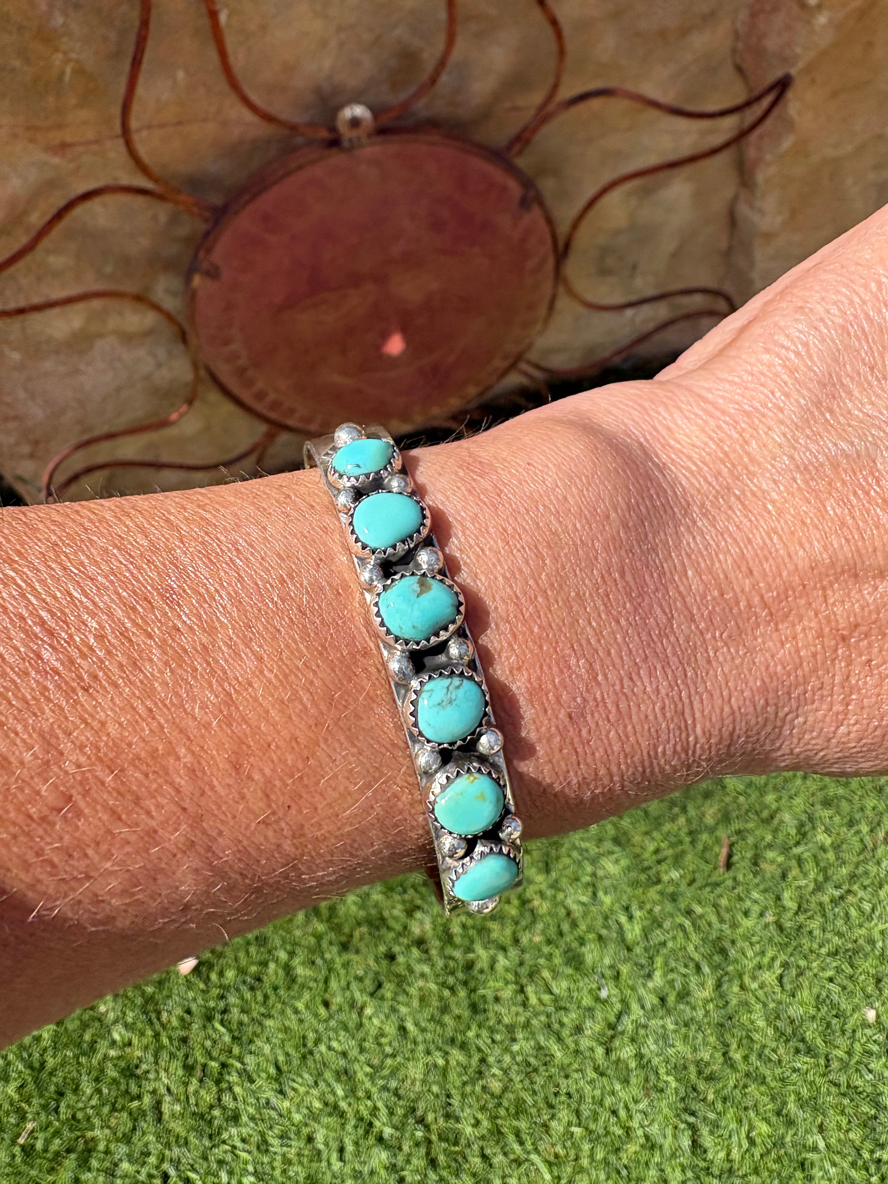 Native made sterling silver with natural eldorado turquoise cuff. Size 6
