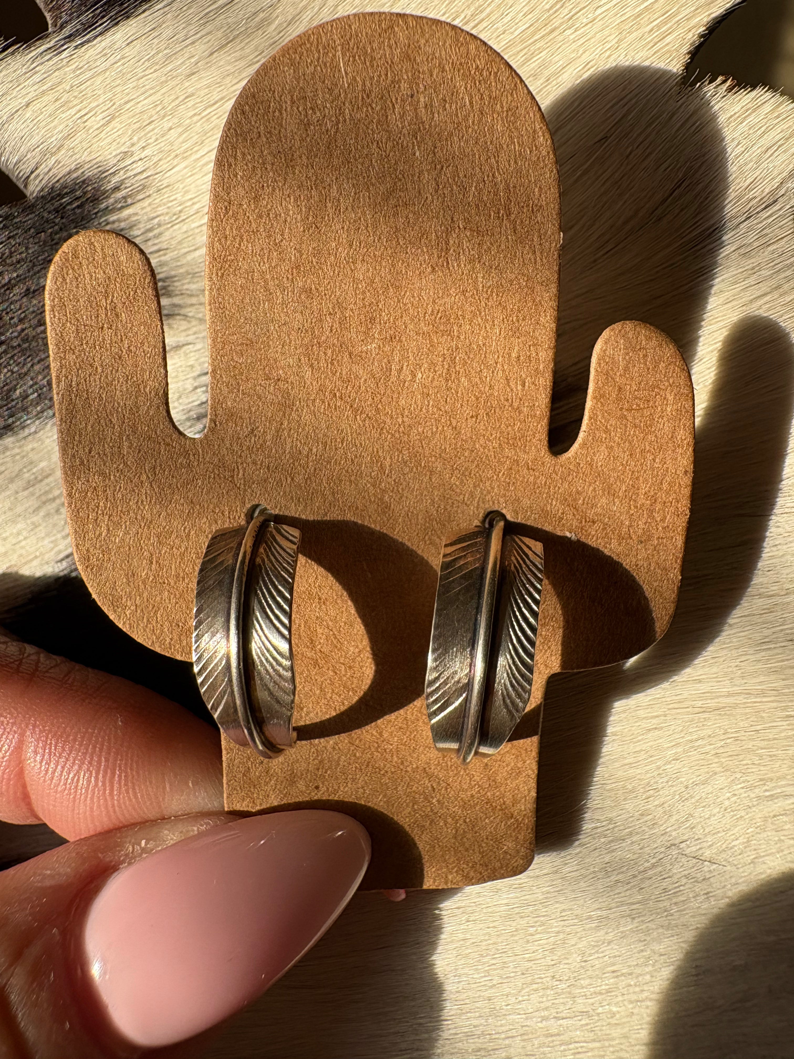 Sterling silver feather post earrings