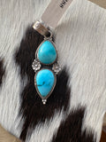 Sterling silver turquoise pendent two stone.