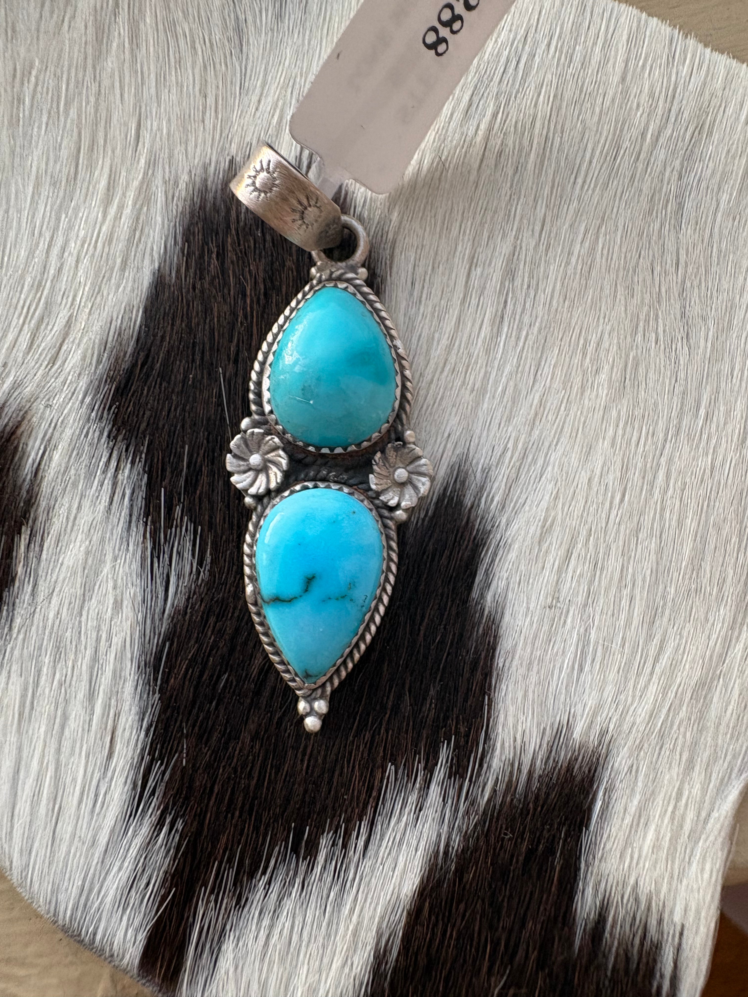 Sterling silver turquoise pendent two stone.