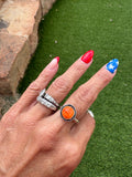 Adjustable orange spiny ring