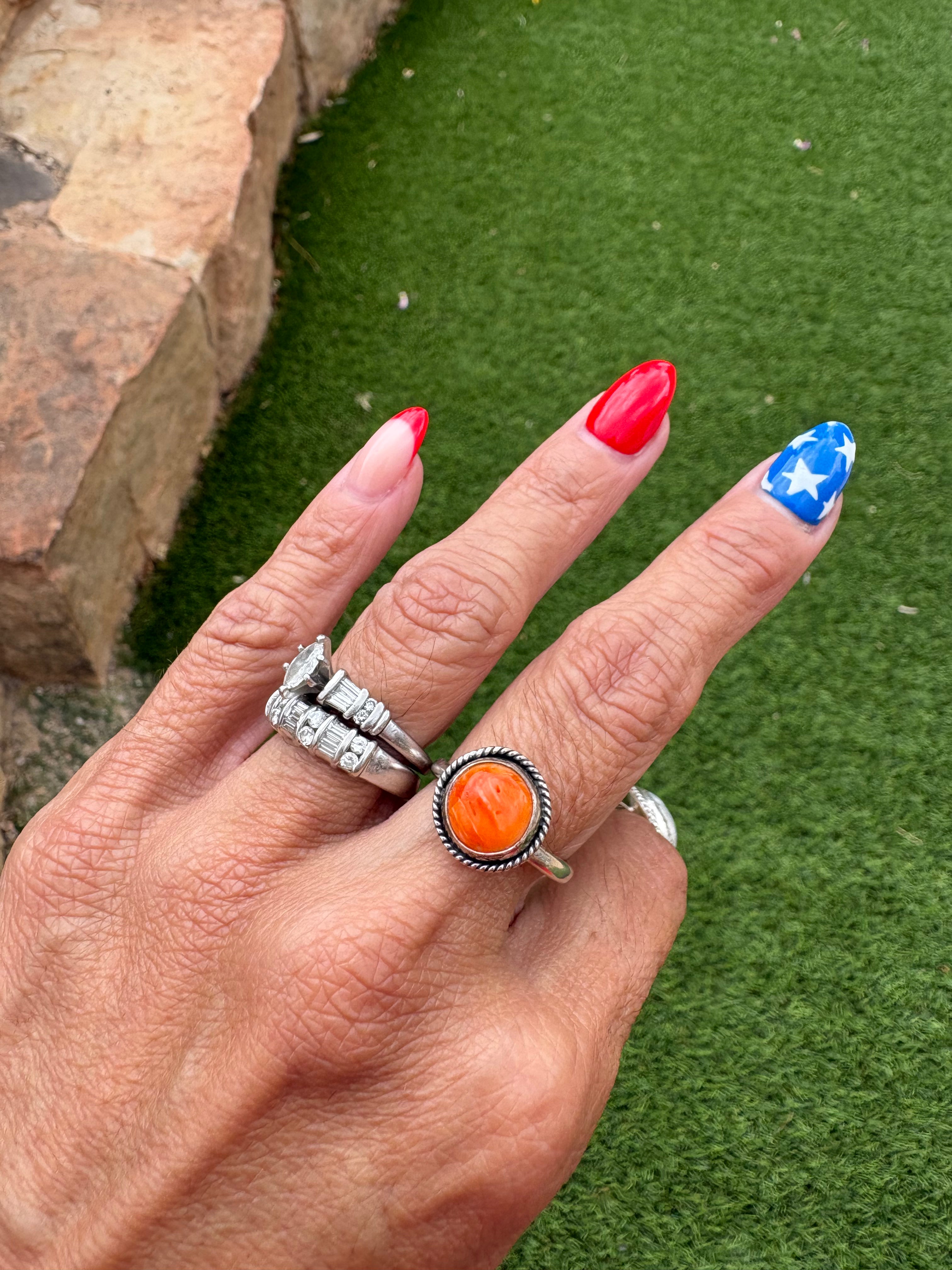 Adjustable orange spiny ring