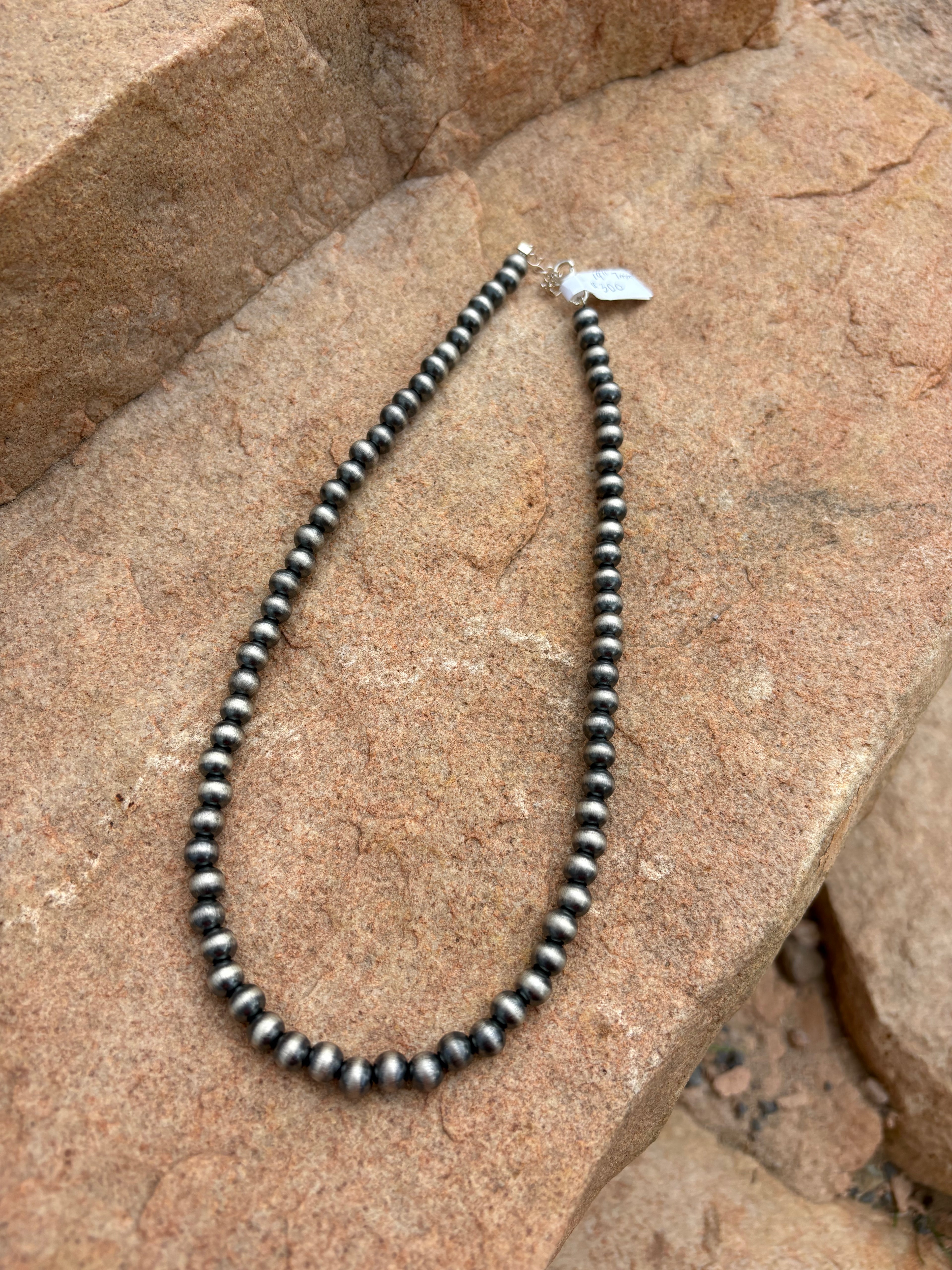 Machine made pearl necklace 16” 7mm