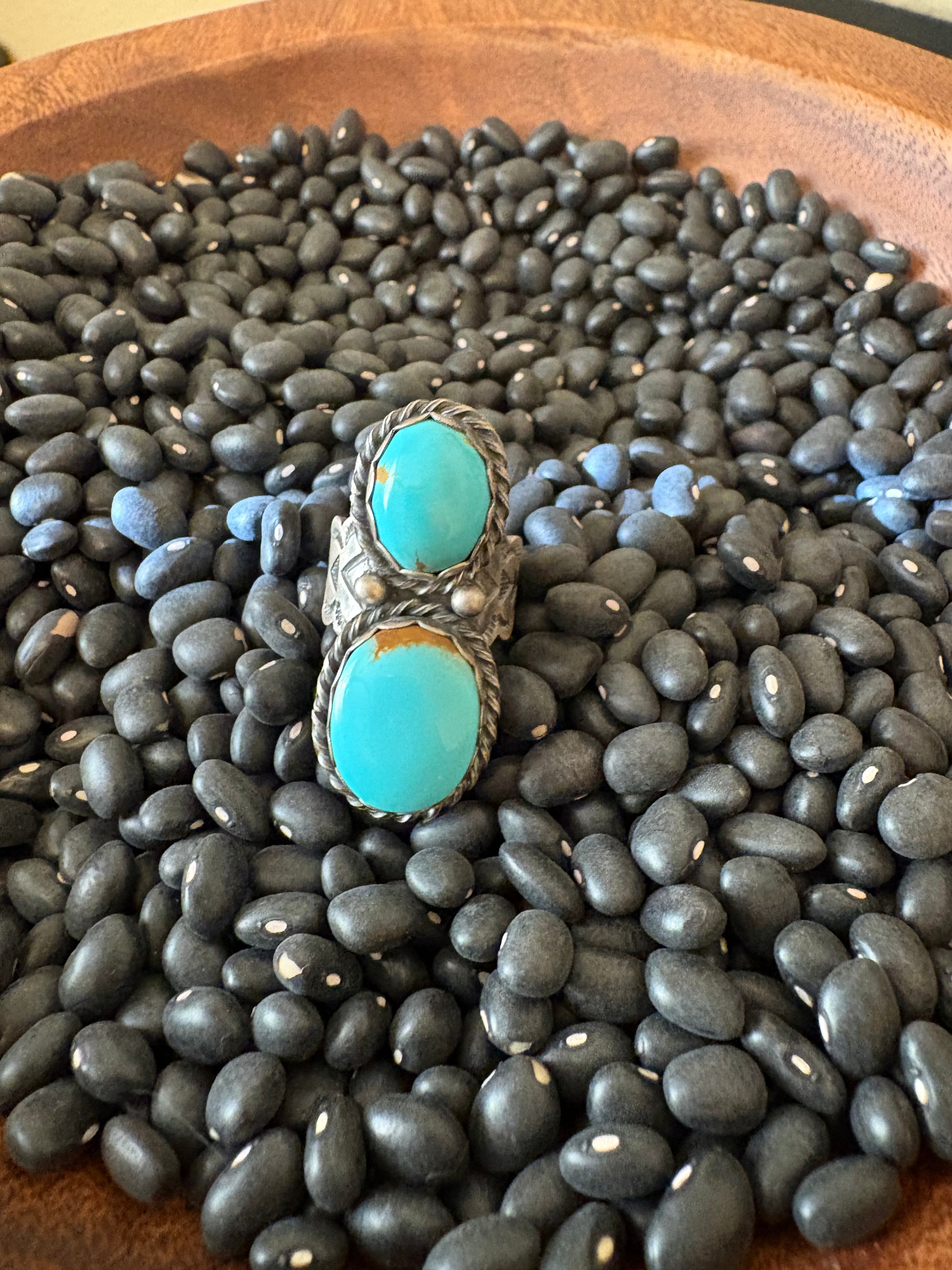 Sterling silver two stone Kingman turquoise ring. Native made and stamped D. BEnally size 7 1/2