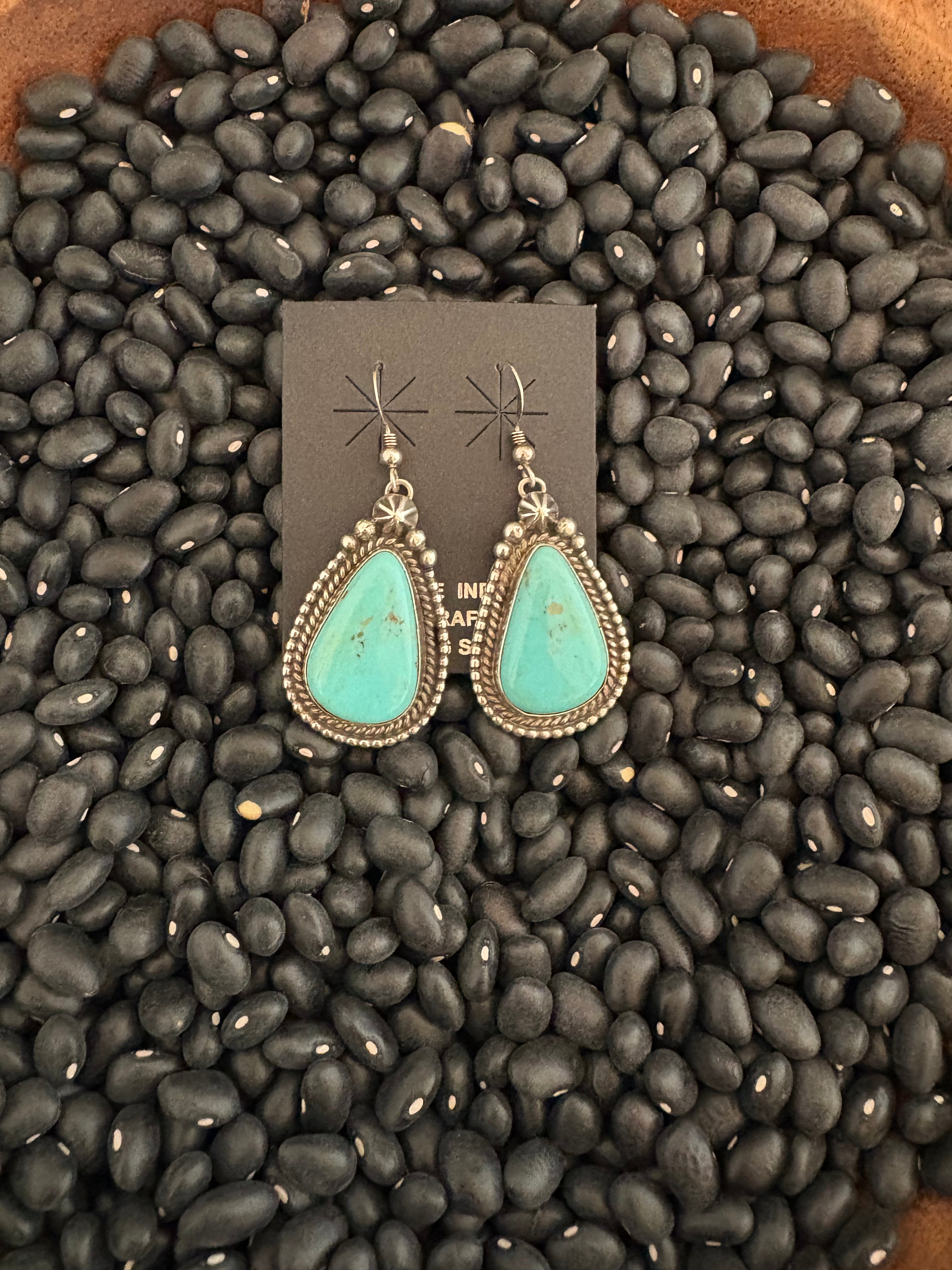 Sterling silver turquoise dangle earrings. Native made and stamped.