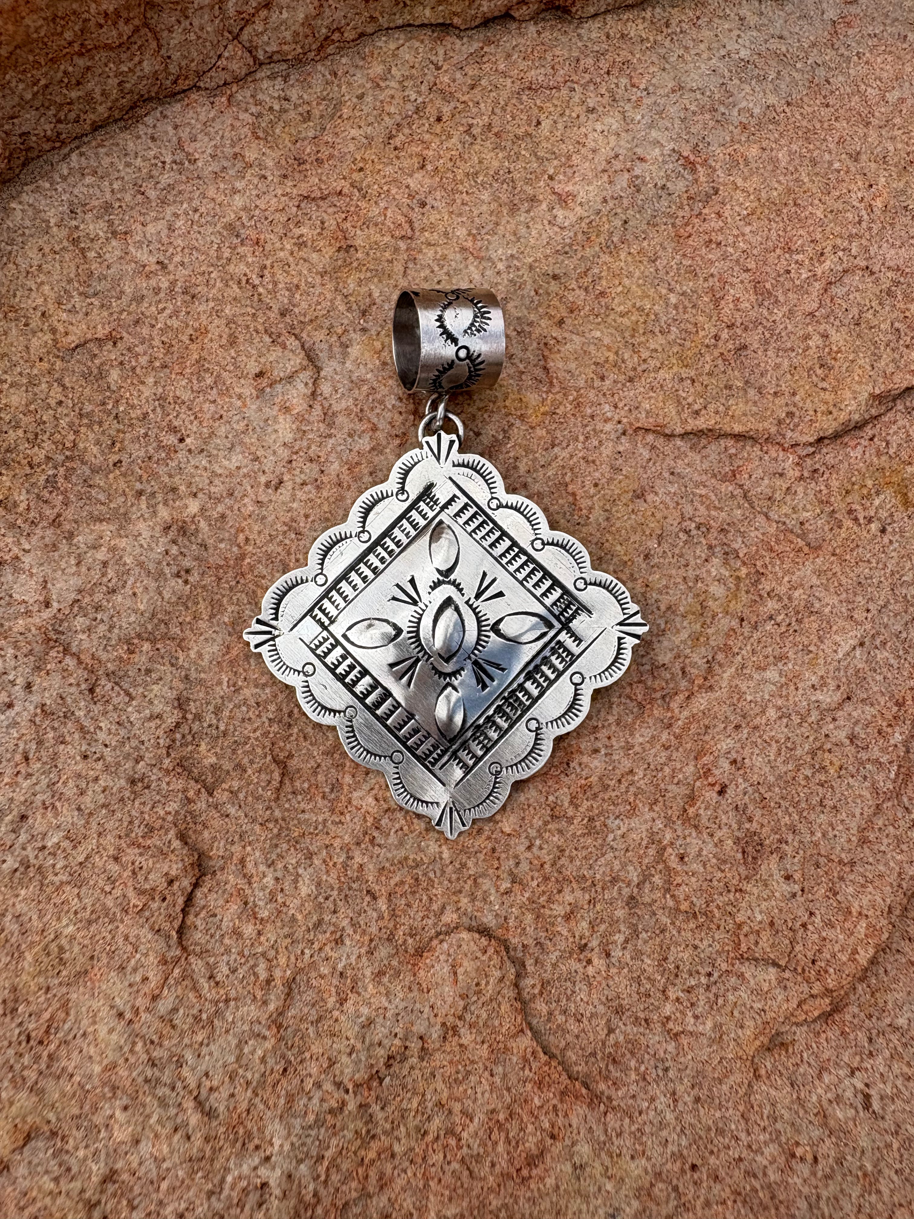 Sterling silver pendent native made and stamped.