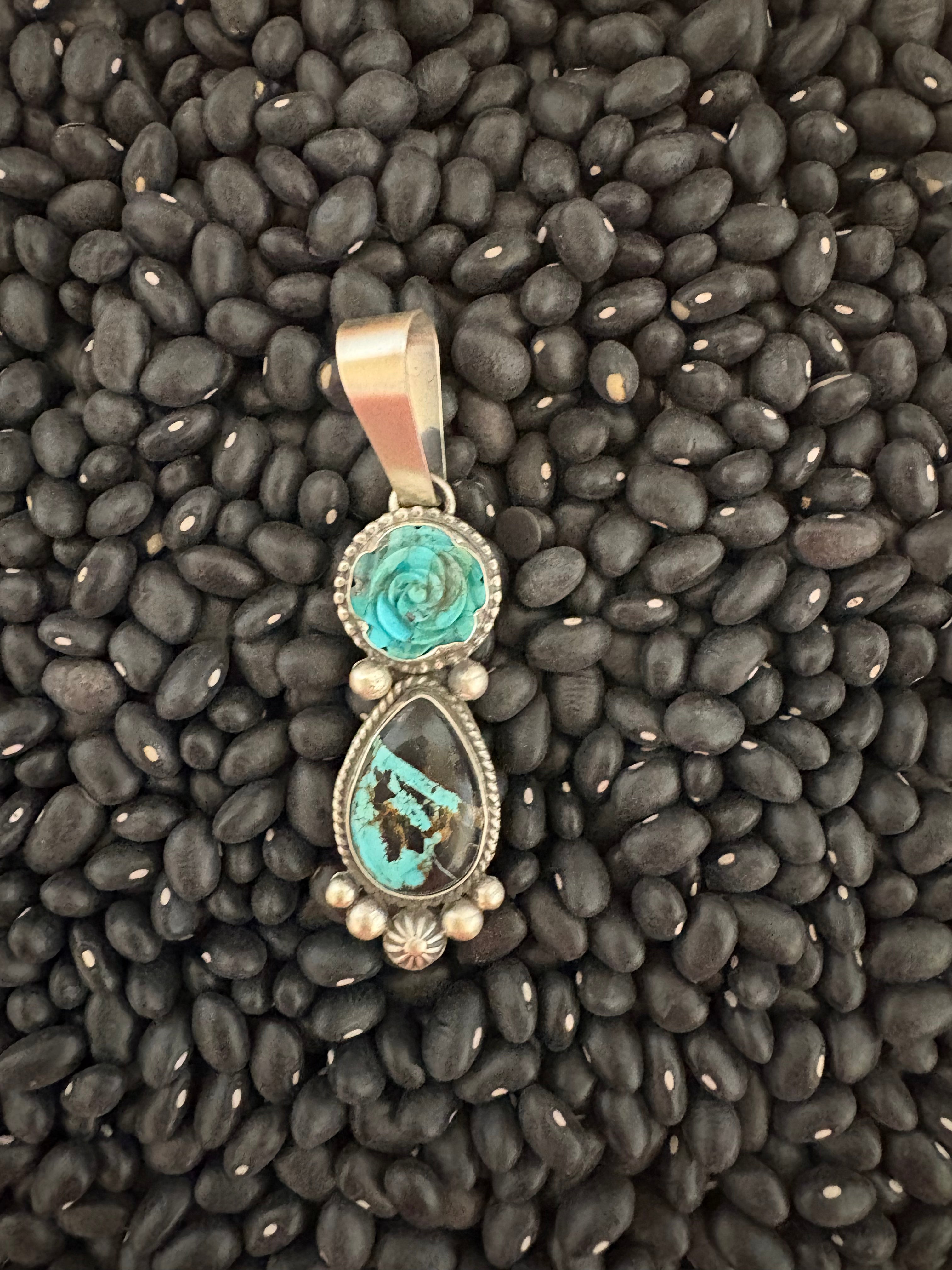 Sterling silver, native made black jack turquoise with flower turquoise pendant.