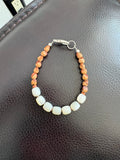 Juniper with morher of pearl bracelet.
