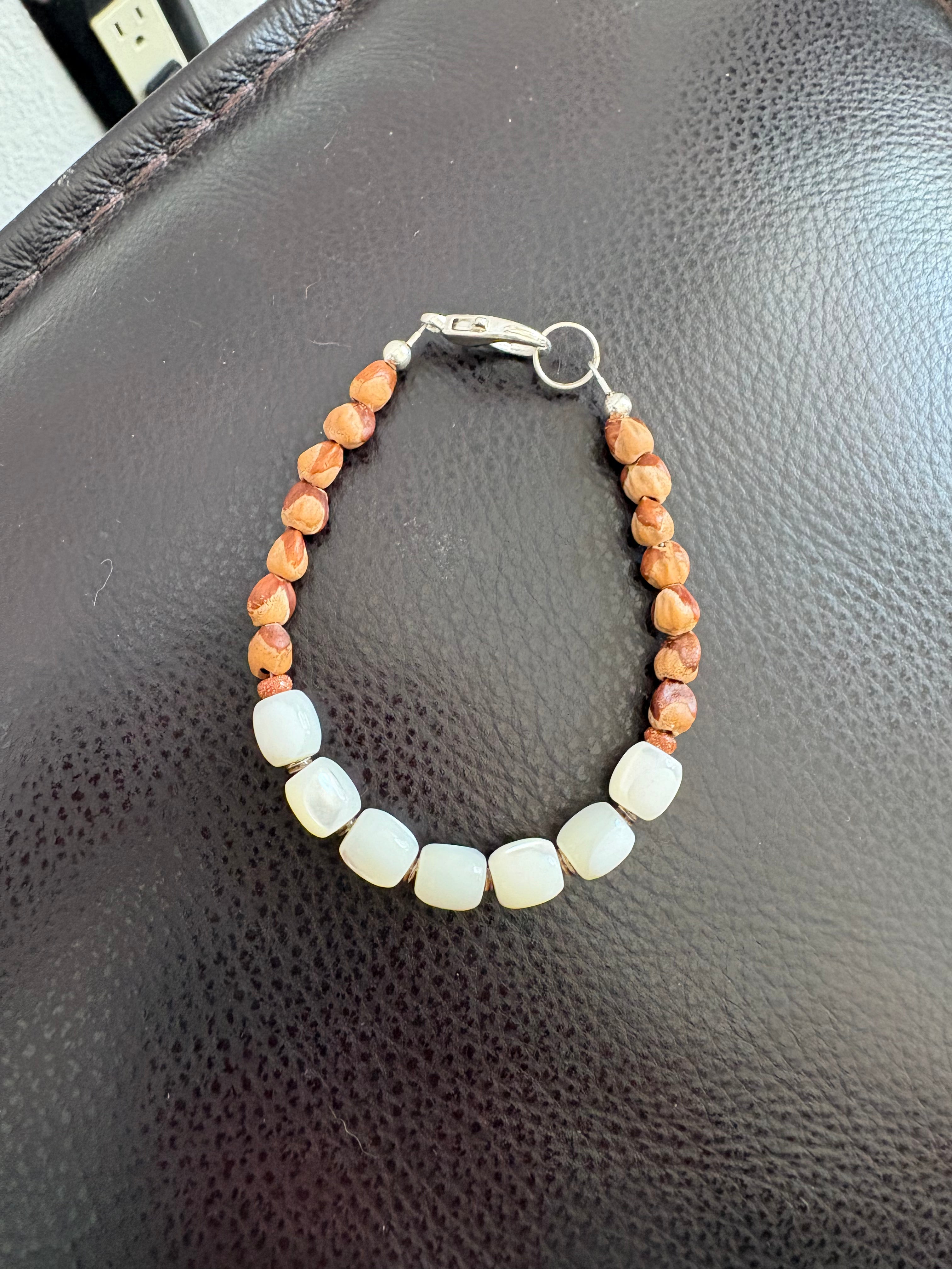 Juniper with morher of pearl bracelet.