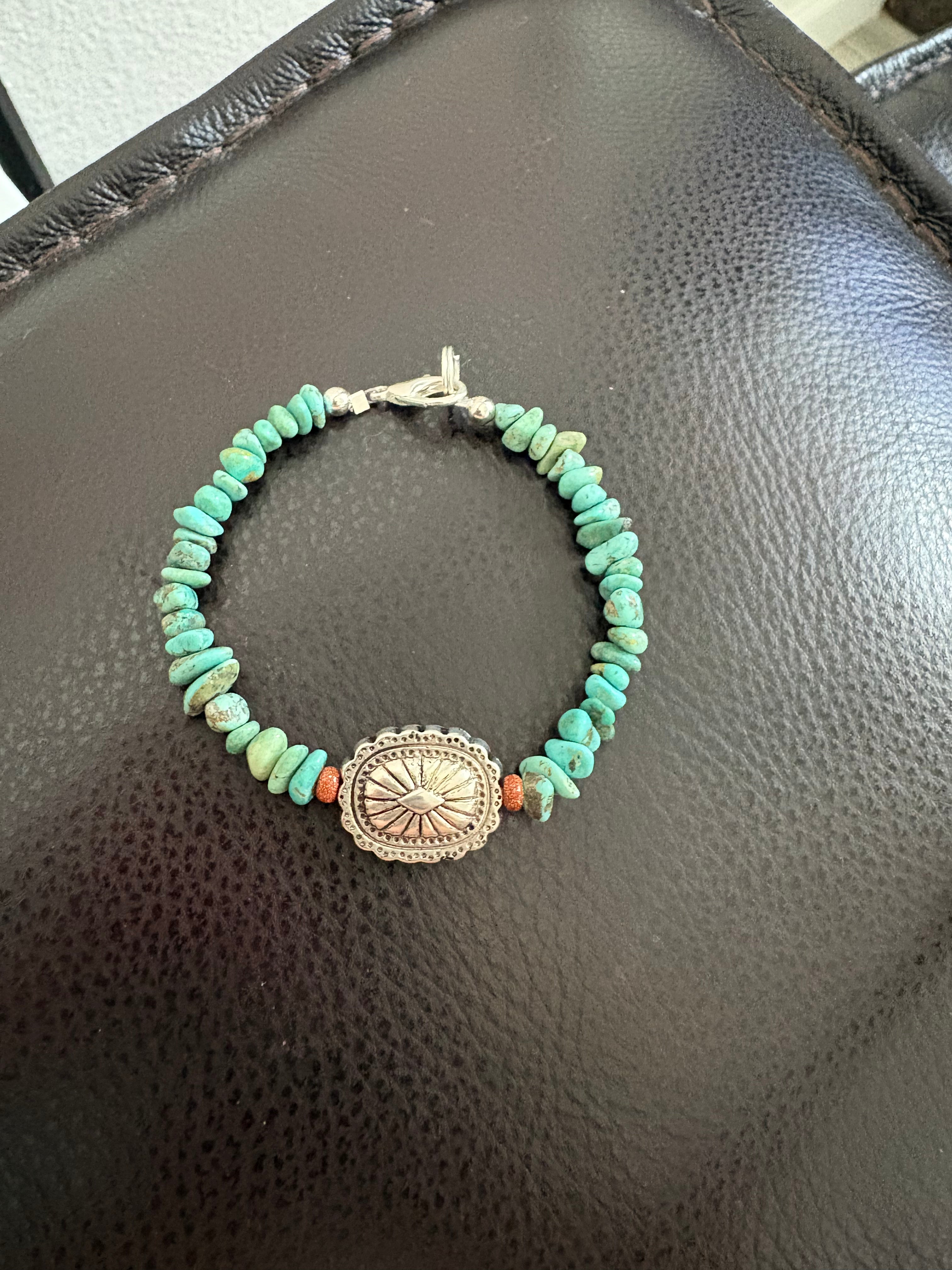 Turquoise bracelet with conch