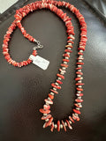 Red spiny 30” necklace with silver pearls.