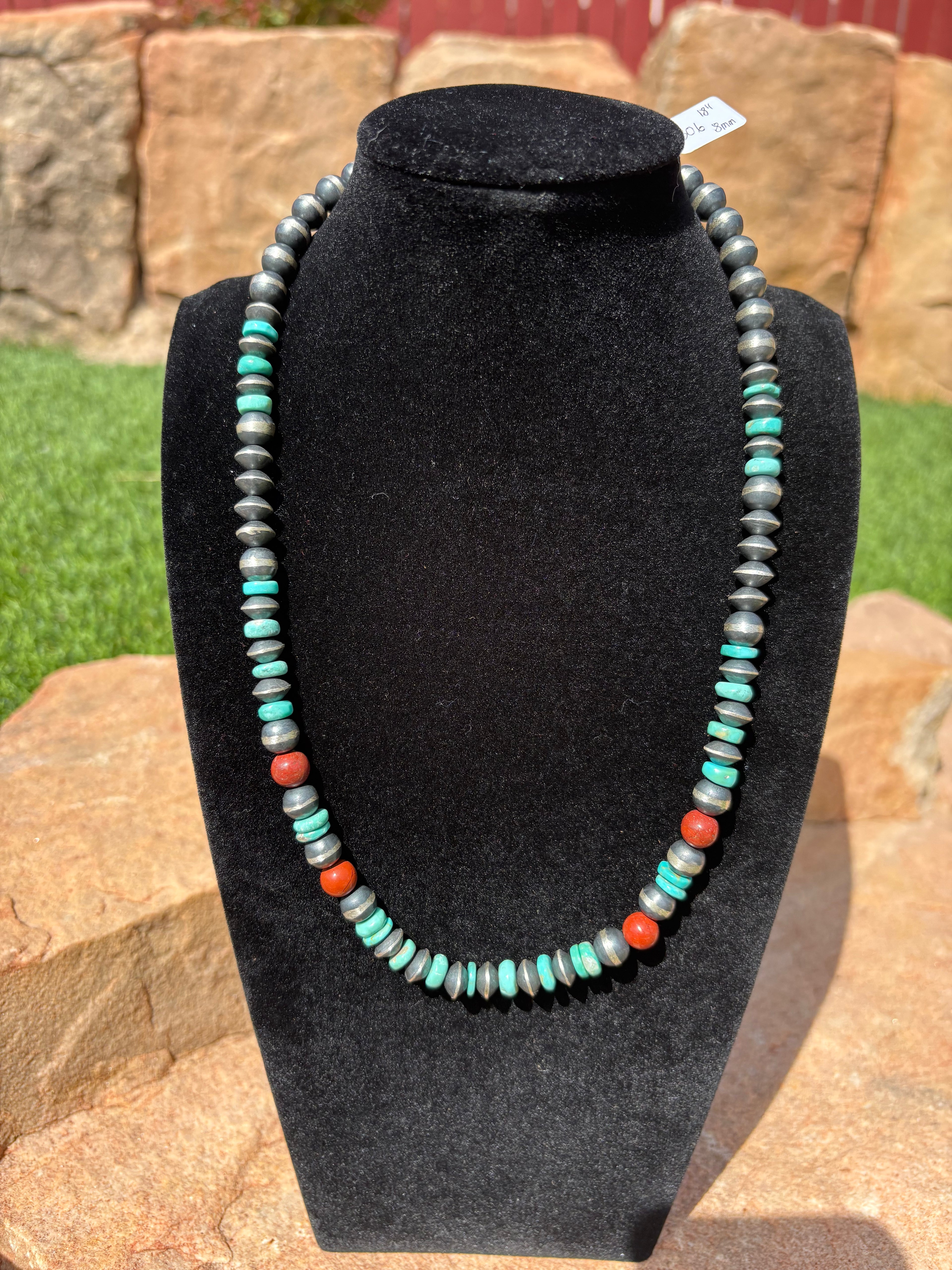 Chimney Butte round and saucer pearl necklace mixed with turquoise and red beads. 18” 8mm
