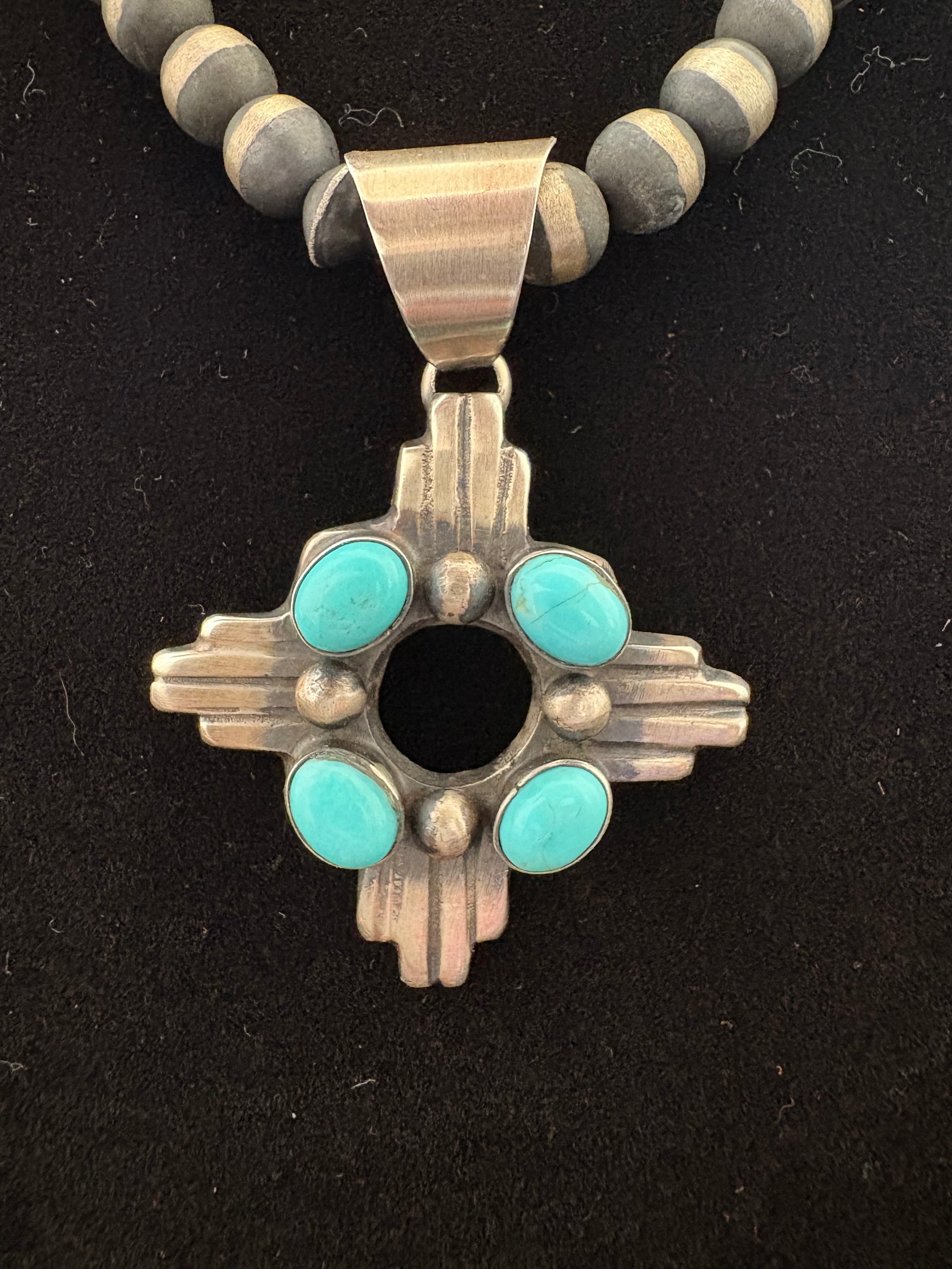 Chimney Butte Zia pendent with Kingman turquoise.