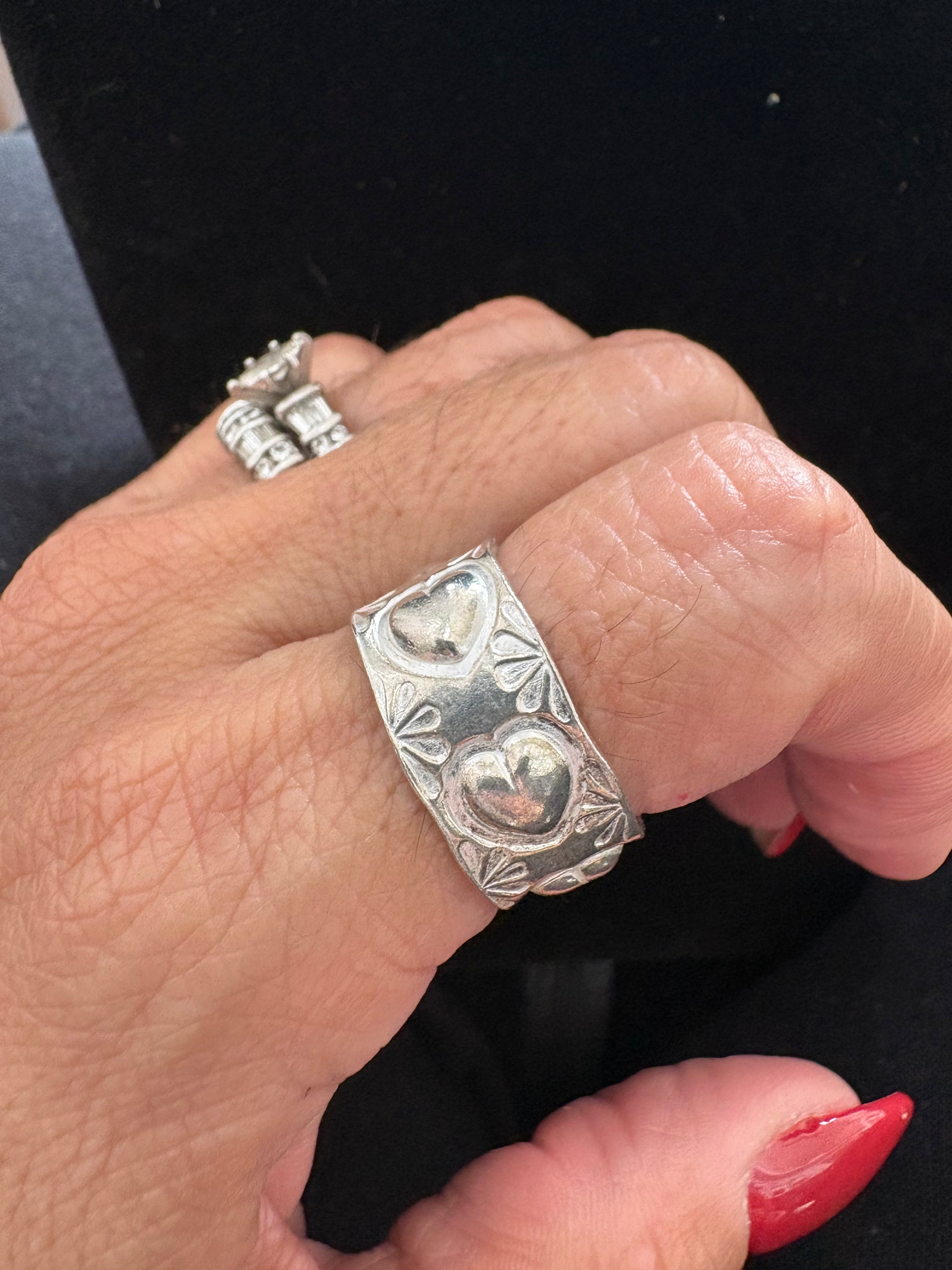 Native hand made cigar heart ring, size 8 artist: Ben Delgarito