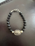 Black beaded with conch bracelet