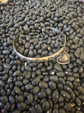 Leigh Cleaveland bangle heart bracelet. Sterling silver and Navijo handmade.